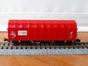 4-achsiger Schiebeplanenwagen Bauart Shimms der Niederländischen Staatsbahn NS (caib)