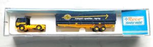 Volvo FL 10, mit 2-achsigem Pritschenauflieger und Plane, schwarz/gelb