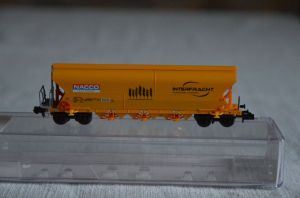 Selbstentladewagen für Getreide, Gattung Tagnpps, 4-achsig, gelborange, ´Interfracht´