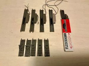 Entkuppler und Prellböcke mit Bettung