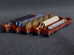 5x Minitrix Hochbordwagen 4-achsig, beladen mit Handarbeits-Ladegüter, Top