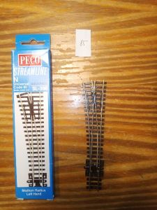 Nr85 Peco Code 80 SL-396 Weiche links mit OVP